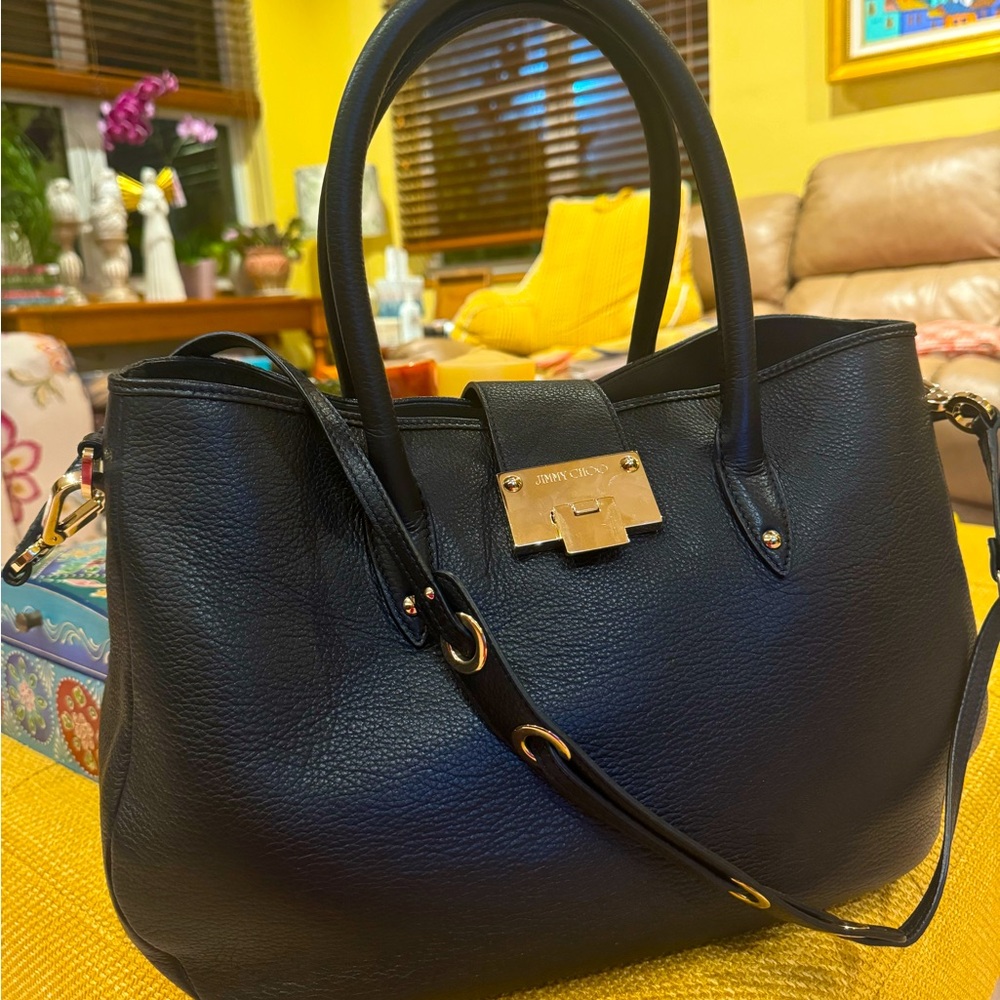 Excellent condition. Perfect size. Jimmy Choo crossbody bag
